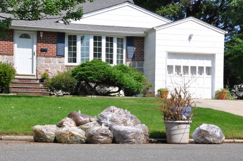 Professionals handling furniture disposal in Havering